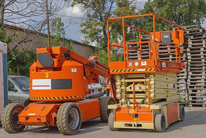 forklift maneuvering through crowded warehouse space in Gardner